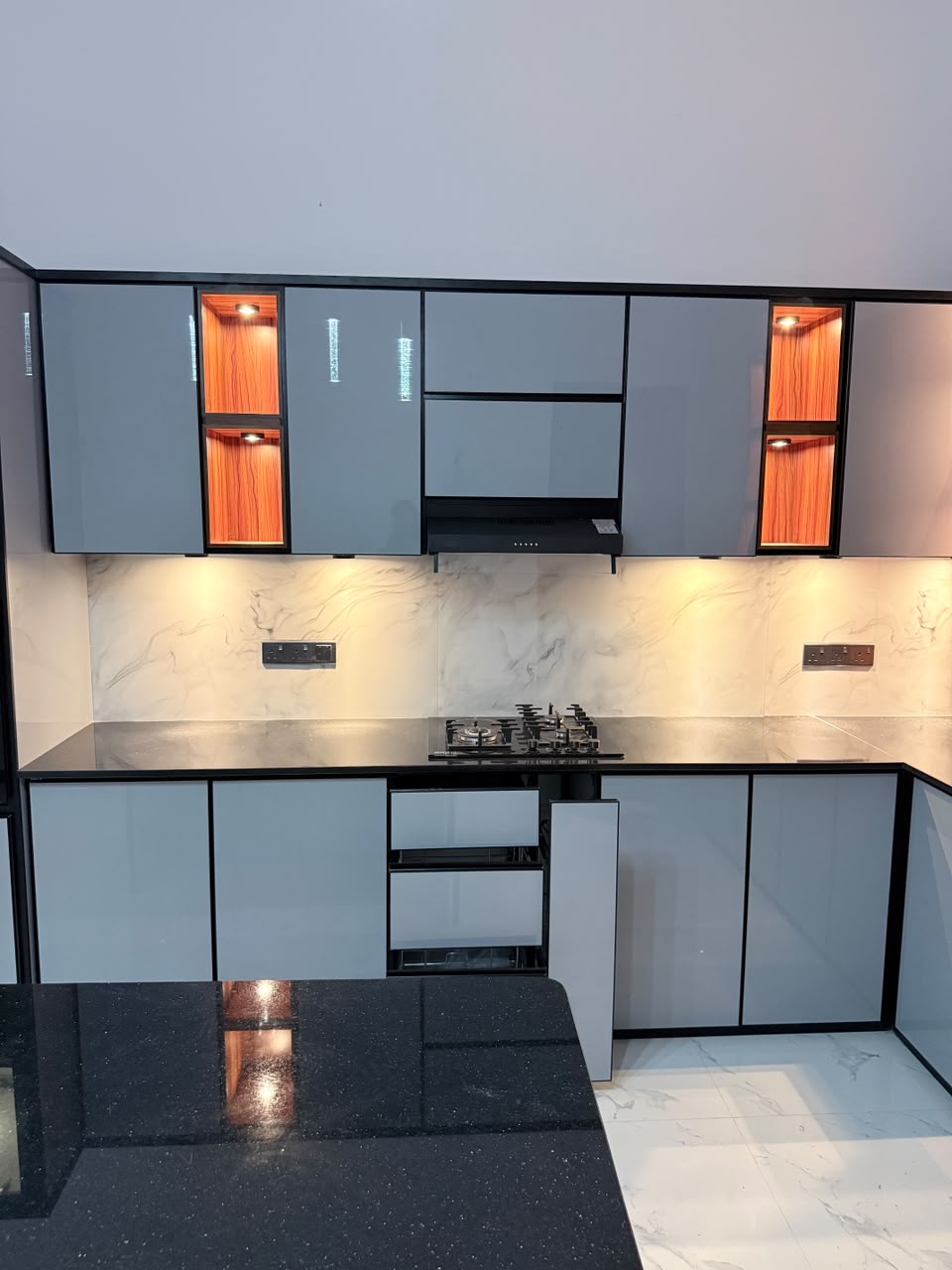 Completed kitchen with aluminium cabinets and countertop